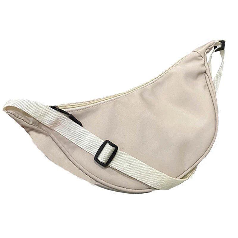 Women's bag - A round-shaped nylon bag with a cross-body strap, suitable for traveling, going to school or shopping.