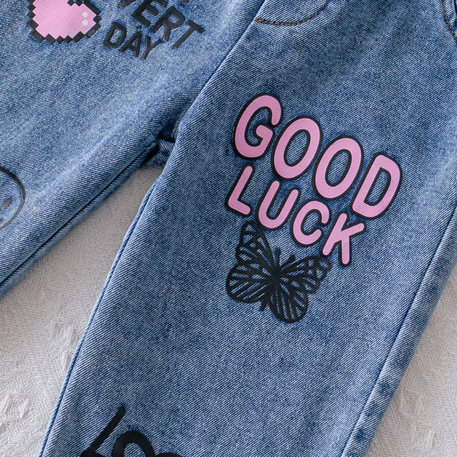 striped cardigan long-sleeved shirt + letter heart print denim trousers suit